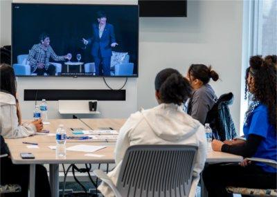 REP4 students watch a livestream of the President Philomena V. Mantella's President's Forum with Carla Harris